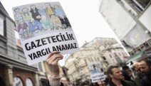 AGİT'ten hükümete: Demokratik toplum için gazetecileri serbest bırakın